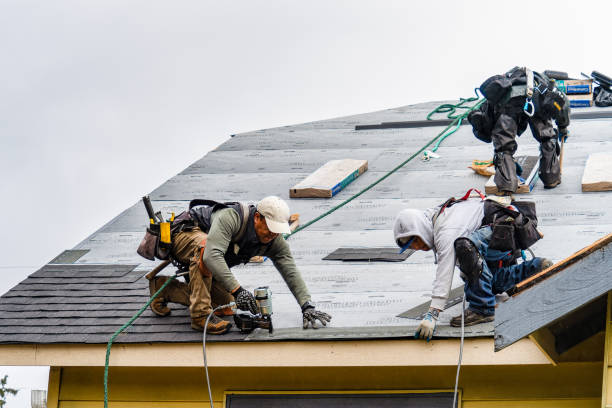 Professional Roof Installation technician working in Pembroke, MA